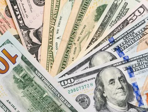 Dollar banknotes close-up top view. Stock Photos