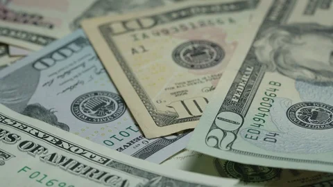 Dollar banknotes of different face value lie in disorder Stock Footage 121508454