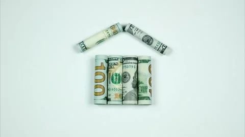 Dollar banknotes move forming a house. Stop motion animation Stock Footage 147402037
