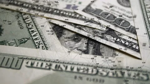 Dollar banknotes rotate and an abstract graph with running digital indices moves Stock Footage 237683490