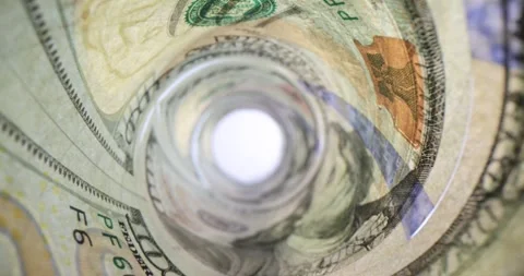 Dollar banknotes with watermarks rolled in tight tube Stock Footage 274700435