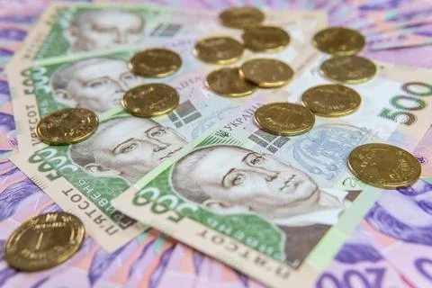 Dollar Bill On Background Of Different Ukrainian Hryvnia Banknotes Stock Photos