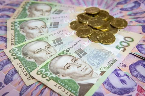 Dollar Bill On Background Of Different Ukrainian Hryvnia Banknotes Stock Photos