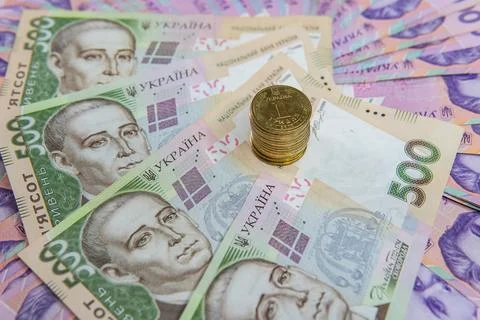 Dollar Bill On Background Of Different Ukrainian Hryvnia Banknotes Stock Photos