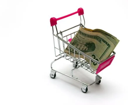 Dollar bill collect on shopping cart.Concept of money. Copy spase, spase for Stock Photos