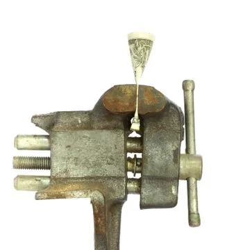 Dollar bill squeezed in vice Foto stock