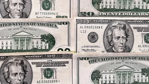 Dollar bills of 20 dollars lie face down and back down in a row on the table Stock Footage 307415445