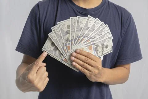 Dollar bills. Close up of hand counting paper dollars. business crisis fina.. Фото