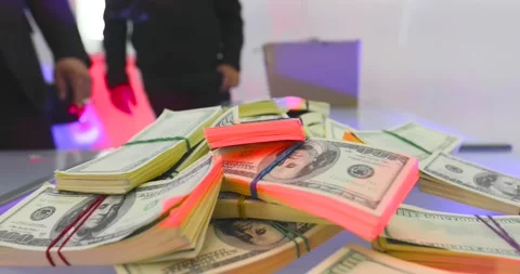 Dollar bills over a table Stock Footage 155456283
