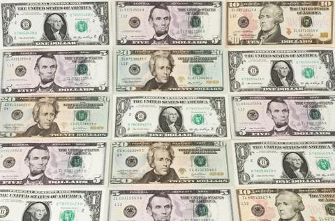 Dollar bills side by side Stock Photos