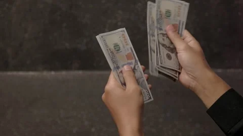 Dollar bills in someone's hand. Video stock 291312071