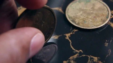 Dollar Coins on hand Stock Footage 111440785