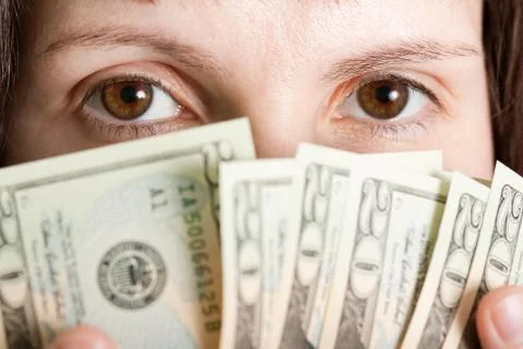 Dollar currency in hand Stock Photos