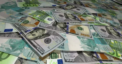 Dollar Euro Real banknotes flying over money surface Stock Footage 221614072