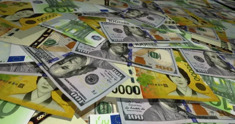Dollar Euro Won banknotes flying over money surface Stock Footage 220835898