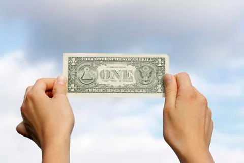 Dollar in hands Stock Photos