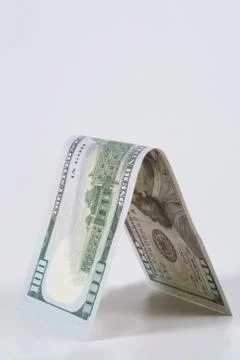 Dollar, model on dollar banknote, concept and idea of time value and money. Stock Photos