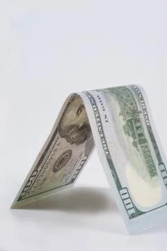 Dollar, model on dollar banknote, concept and idea of time value and money. Stock Photos