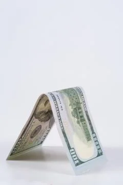 Dollar, model on dollar banknote, concept and idea of time value and money. Stock Photos
