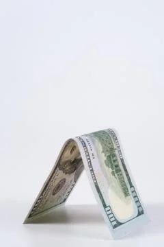 Dollar, model on dollar banknote, concept and idea of time value and money. Stock Photos