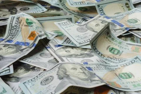 Dollar notes are lined up on a table close-up, a texture of dollar bill. 스톡 사진