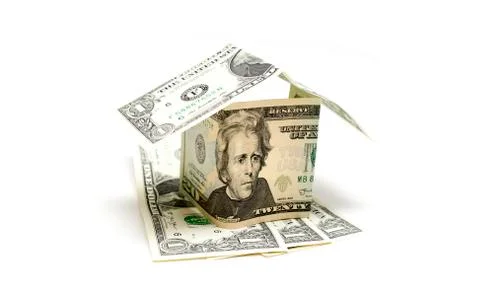 Dollar notes folded into shape of a house and roof with notes under on white  Stock Photos