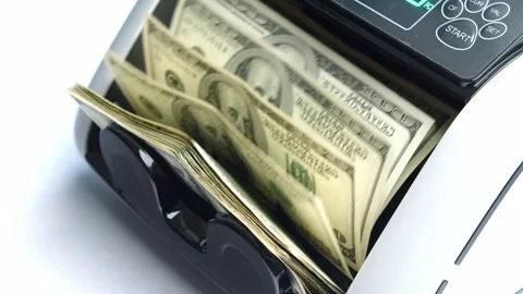 Dollar Notes In Motion Through Automated Money Counter Video stock 314343911