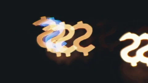 Dollar sign shaped bokeh of car lights at night. Stock Footage 80477745