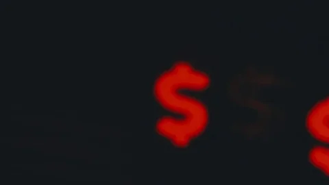 Dollar sign shaped bokeh of car lights at night. Stock Footage 80477760