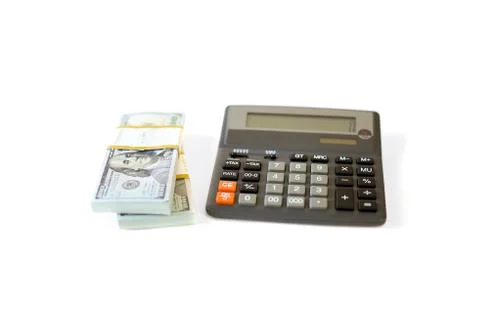 Dollar stack and calculator isolated Stock Photos