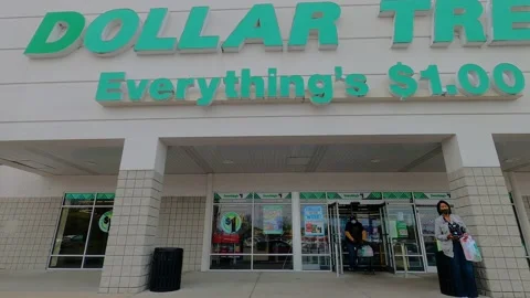 Dollar tree retail store during covid-19 pandemic customers exiting wearing f Stock Footage 147896807