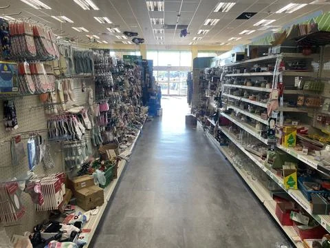 Dollar Tree retail store interior cluttered and messy looking to front of sto Stock Photos