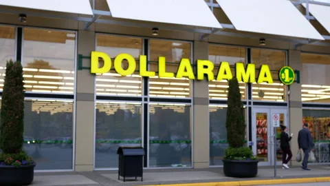 Dollarama storefront with people passing by the store with 4k resolution. 스톡 동영상 210748707