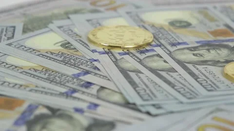 Dollars and bitcoin, Many dollars and bitcoin spinning as 3 version timelapse Stock Footage 159023277