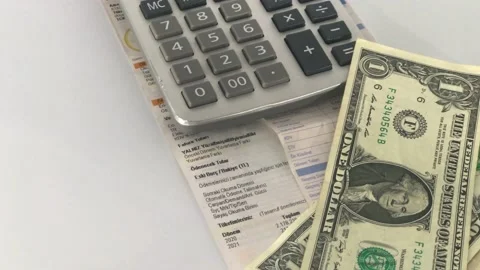 Dollars and calculator bills Stock Footage 146756272