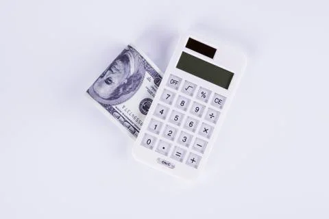 Dollars and Calculator Stock Photos