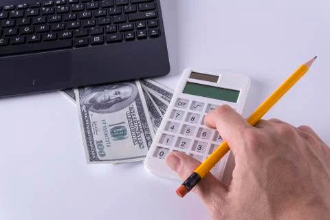 Dollars and Calculator Foto stock