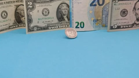 Dollars and euros on the blue Видео 334957721