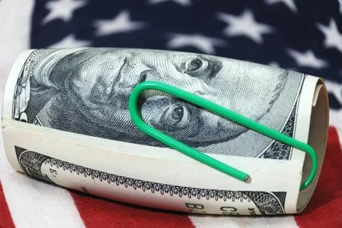 Dollars and flag Stock Photos