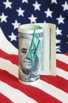 Dollars and flag Stock Photos
