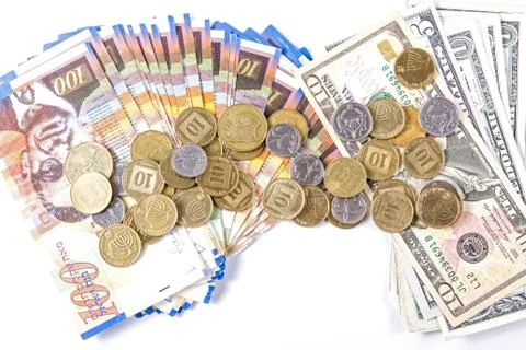Dollars and shekels. Stock Photos