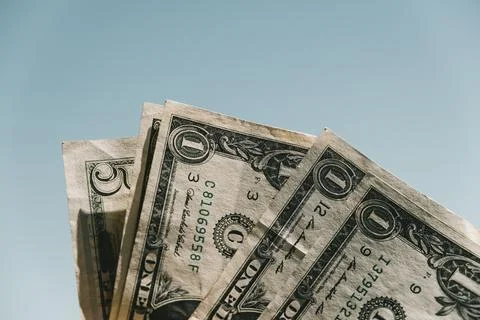Dollars are in someone's hands Stock Photos