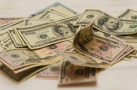 Dollars background. Dollars background. Background of different us dollar ban Stock Photos