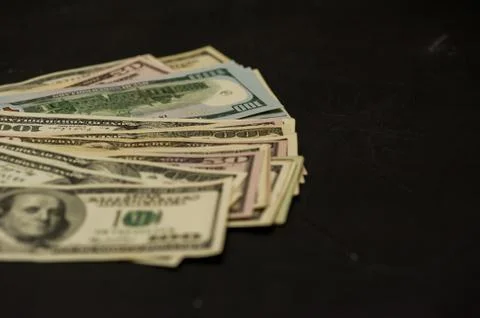 Dollars background. Dollars background. Background of different us dollar ban Stock Photos