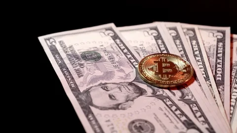 Dollars bank notes and bitcoin coin business background Stock-Footage 72374580
