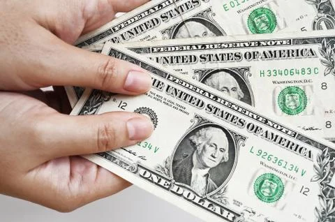 Dollars bill on hand Foto stock