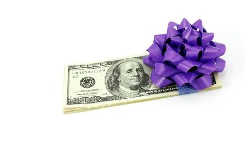 Dollars with a bow Stock Photos