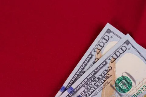Dollars bundles on a red background Stock Photos