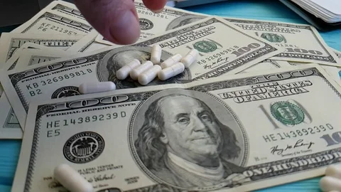 Dollars capsule hands Stock Footage 88101242