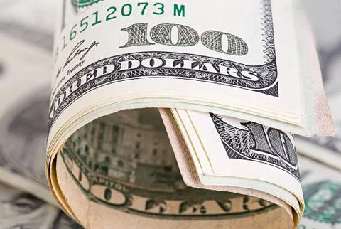 Dollars close-up as a background. Stock Photos